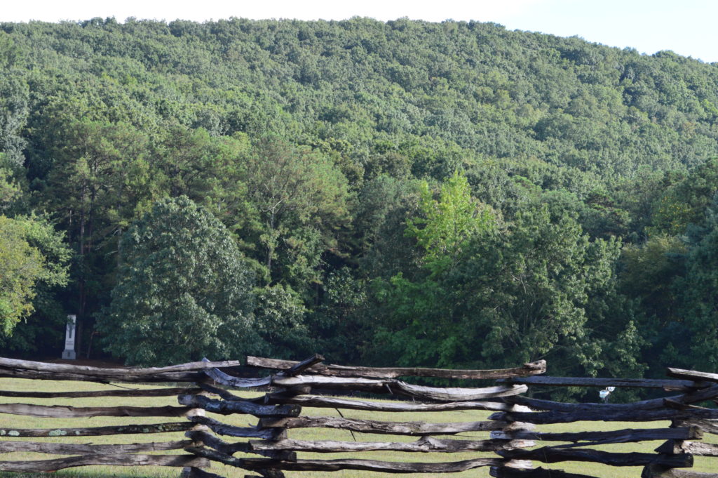 Overlooking Kennesaw Mountain with cross rail fence in the foreground
